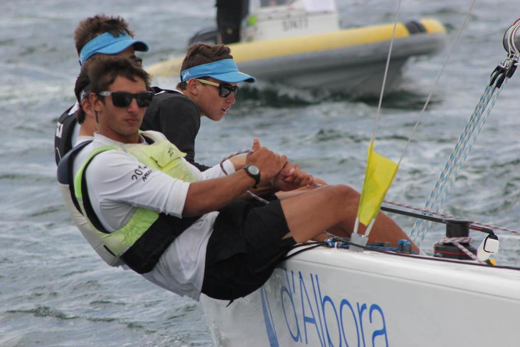 Harry Price looking for the shifts in the breeze - Musto International Youth Match Racing Championship 2013 © CYCA Staff .